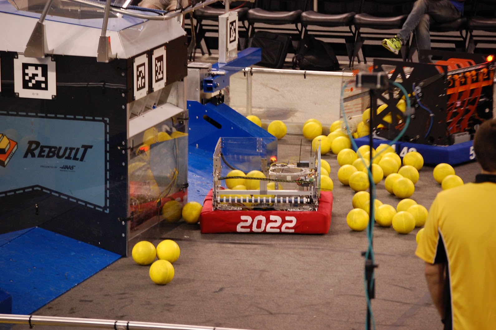 The robot driving on the 2026 field with game pieces in its hopper.